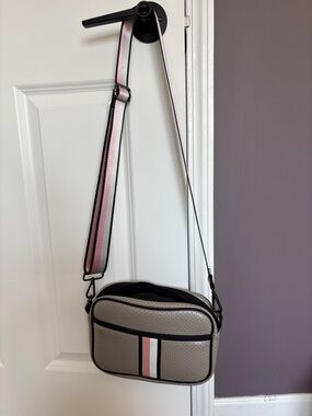Haute Shore Neutral grey Crossbody with Pink and White Stripe